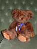 Present from the University of Memphis. Rockey is a UM bear; his name is that of the (bird) mascot of the Memphis Redbirds baseball team
